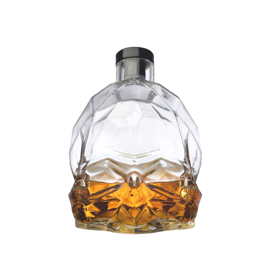 NUDE Memento Mori skull shaped whisky bottle filled front view