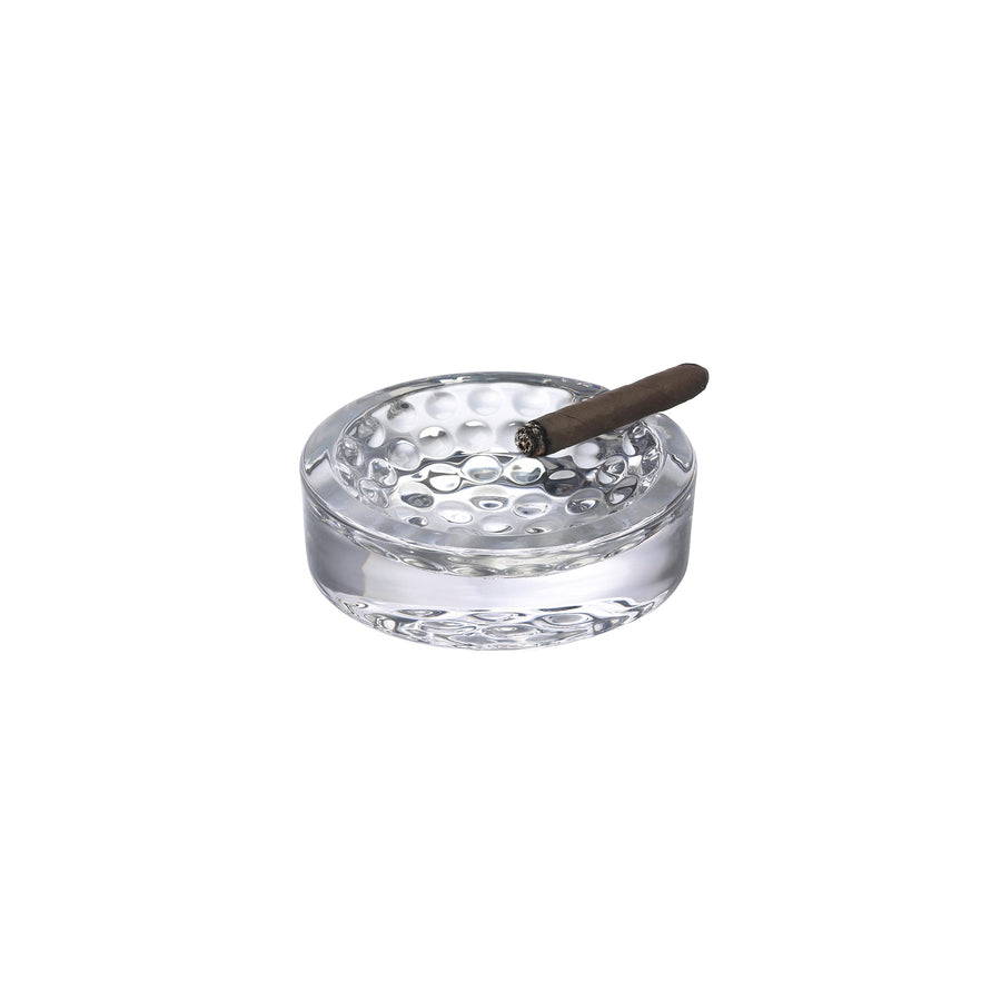 NUDE Ace Ashtray in leadfree crystal with golf pattern on the bottom presented with cigar